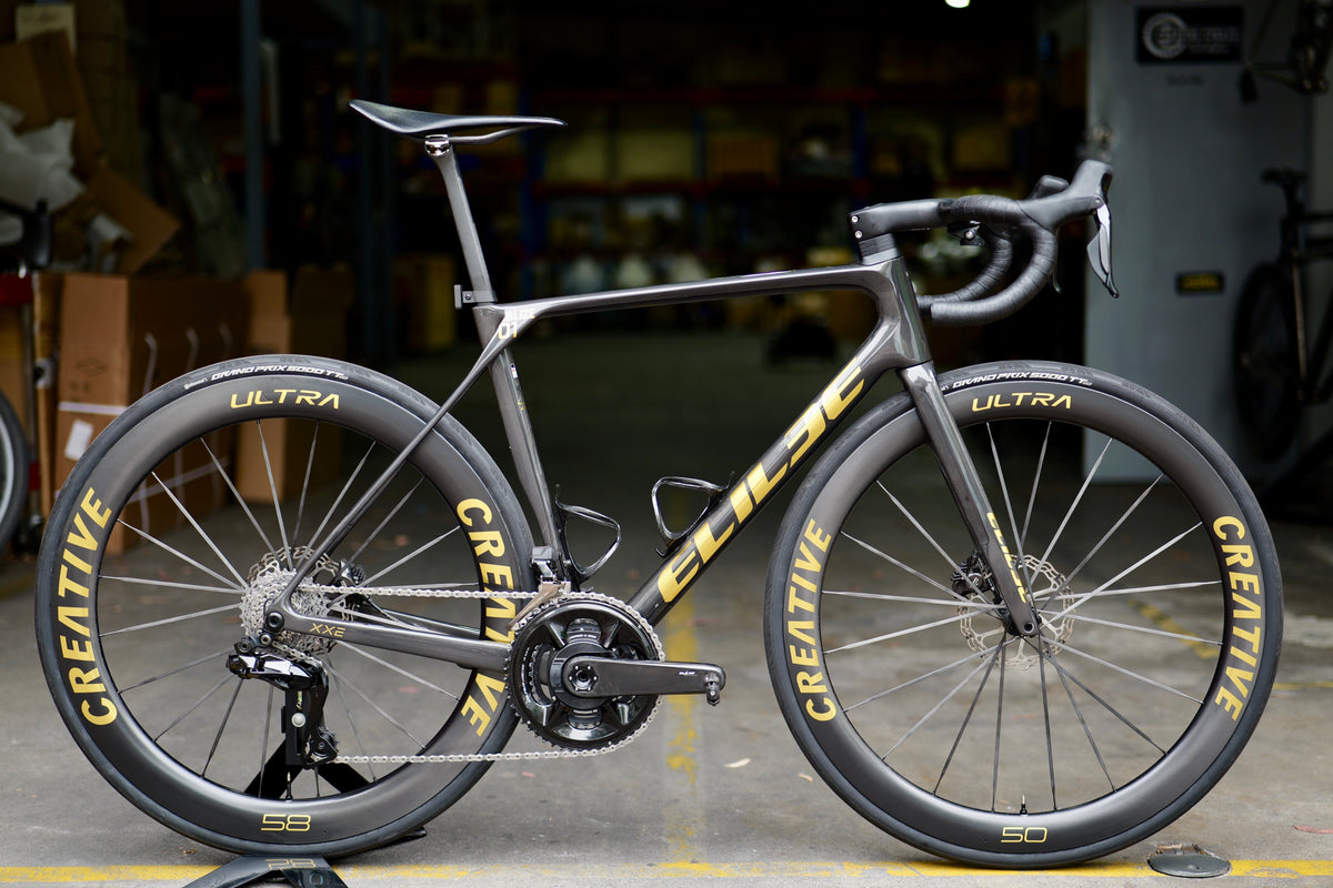 Elilee Blize XXE Limited Edition Gold, built at the Workshop on CREATIVE ULTRA 58/50 wheels
