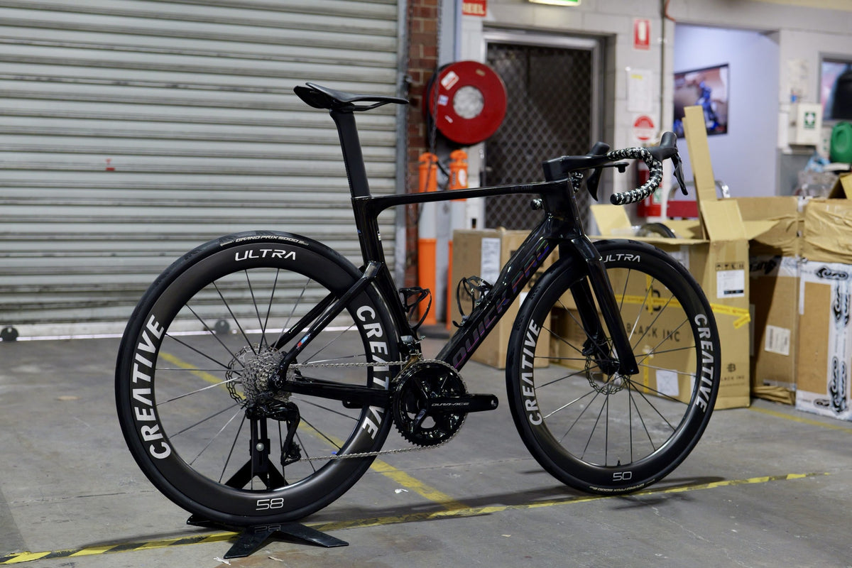 A CREATIVE-built bike in front of the Workshop roller door